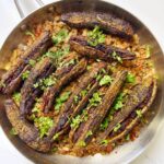 bitter gourds are stuffed with ground beef and then fried