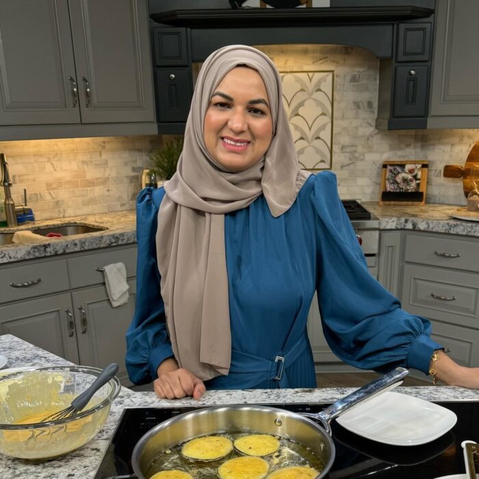 Saba Ahmad headshot in kitchen.